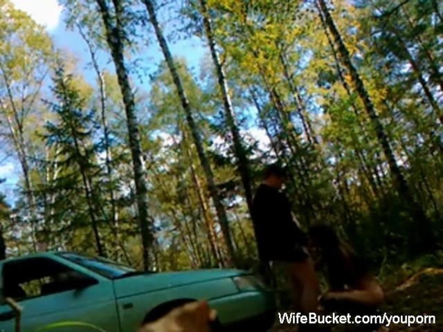 wife with dark hair is fucking in a doggy style outdoor