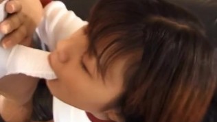 Eri Ueno in sexy uniform sucks cock over boxers until gets cum